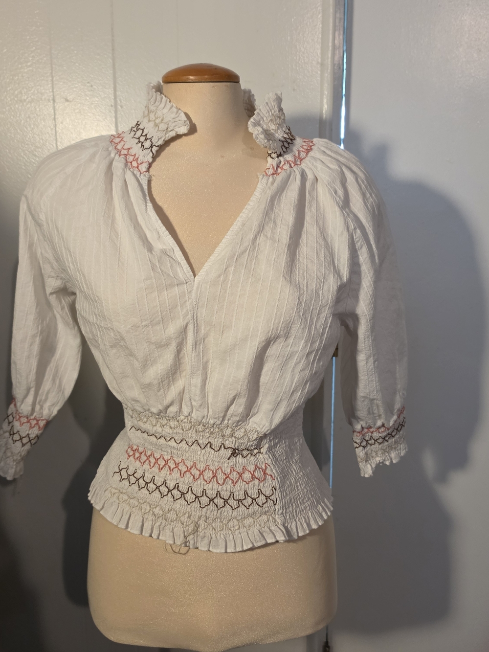 Women's White Smocked Peasant Blouse with Embroidered Detail